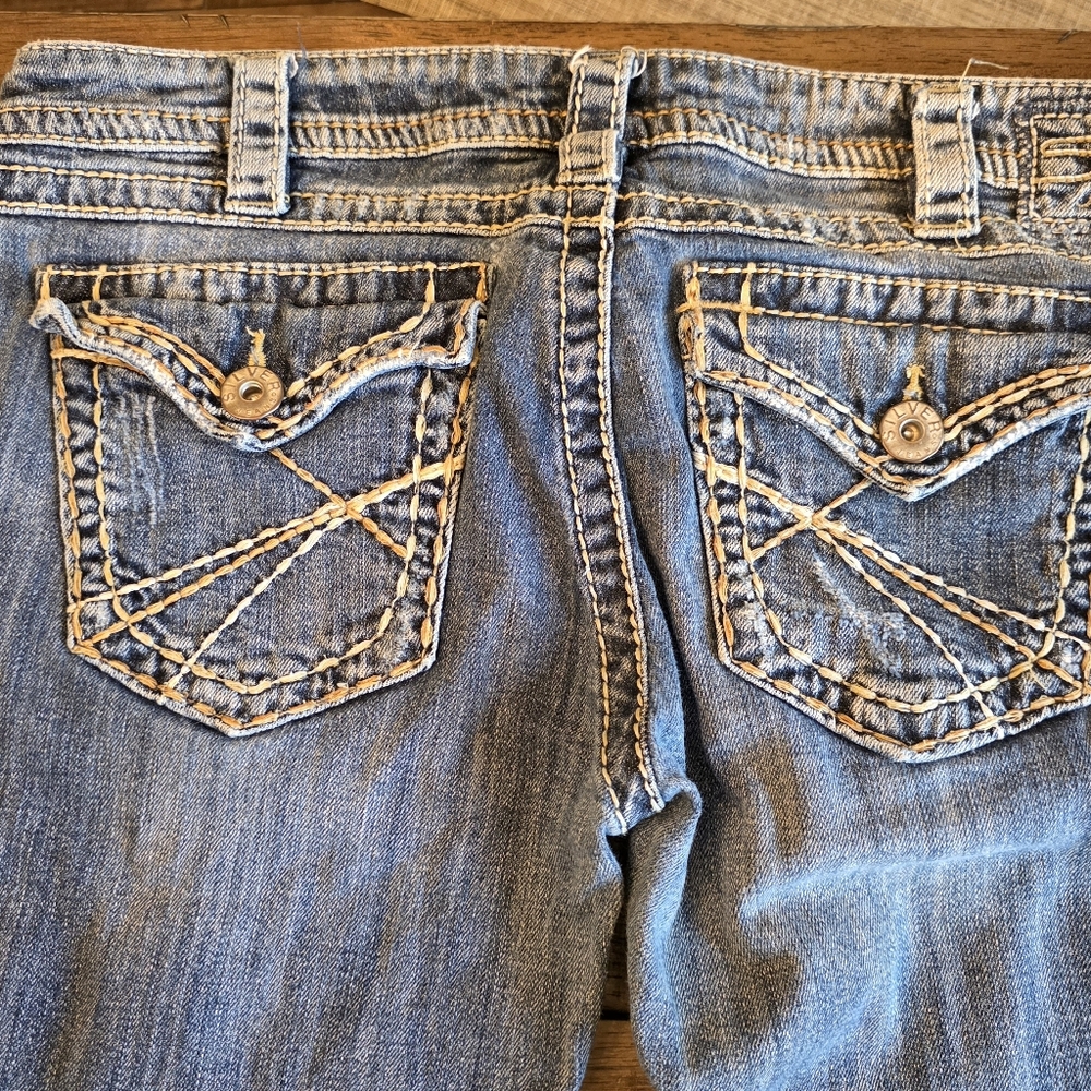 Silver Jeans Women's Boot Cut Distressed Denim